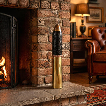 British WW1 18 pounder militaria relic trench art, a brass shell, a black shrapnel case and a brass fuse, upright, for display or militaria gift, on a fireplace in a warm coy room setting