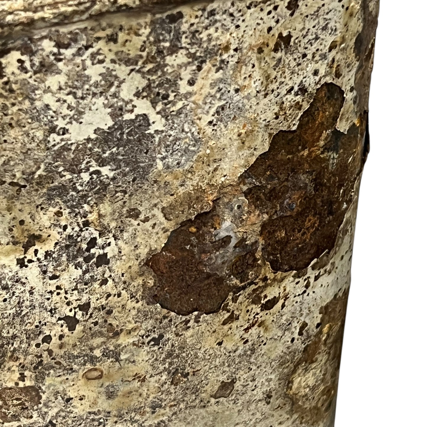 close up of a rusty water bottle on a white background 