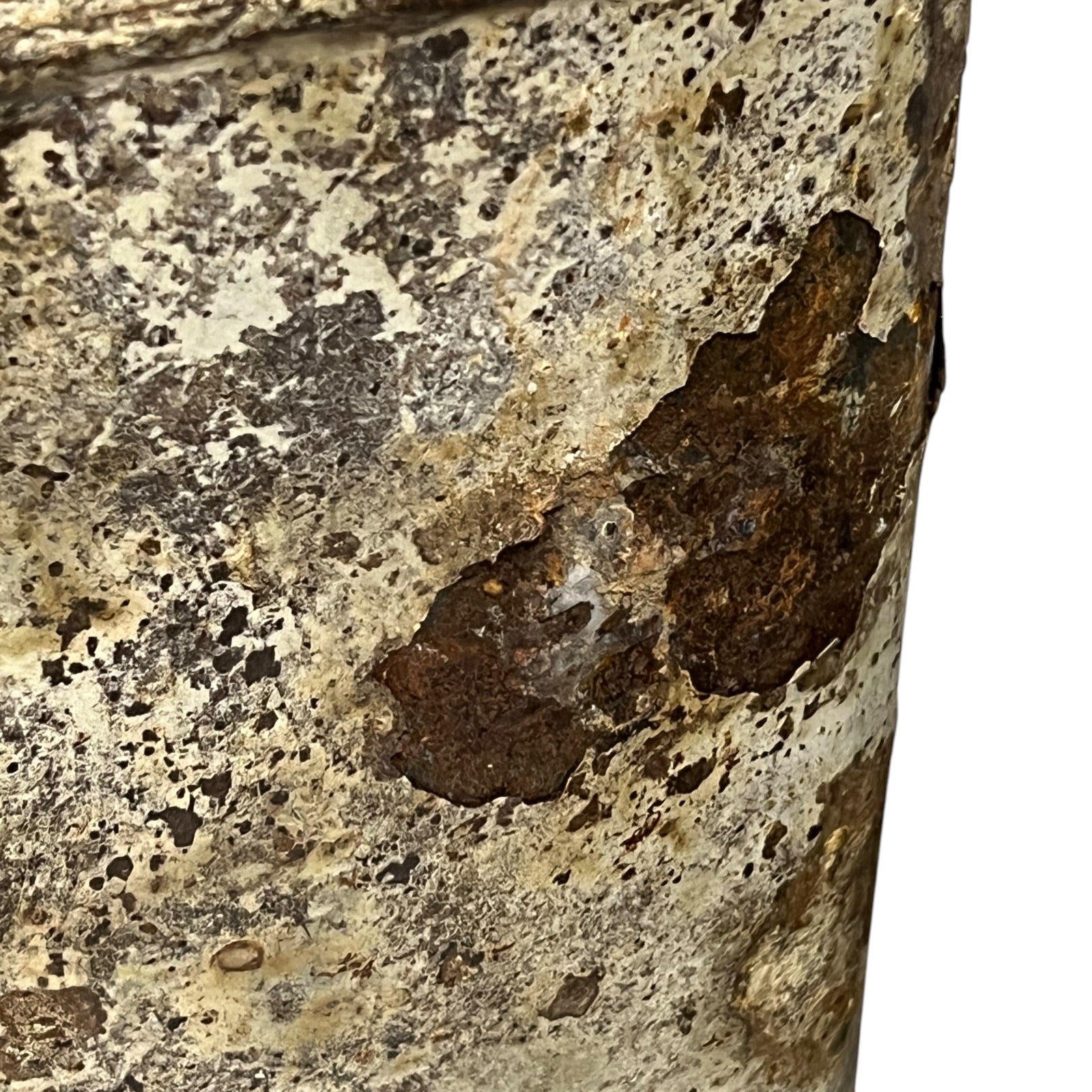 close up of a rusty water bottle on a white background 