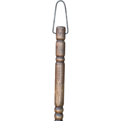 wooden handle of copper ladle