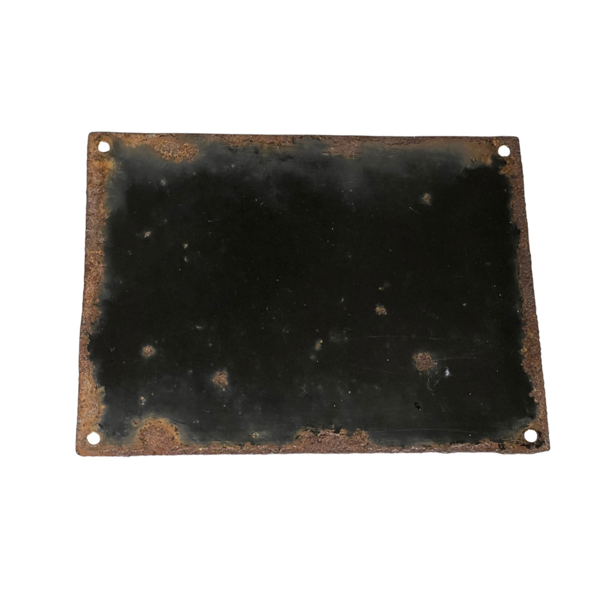 A rectangular black metal plate with rounded corners and four pre-drilled holes, showing significant rust and weathering along the edges, isolated on a white background.