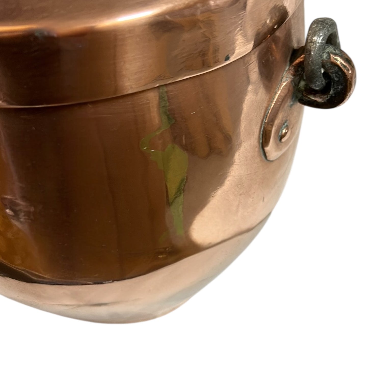 Close up of a copper cooking pot stockpot with handles on a white background