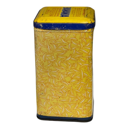 Yellow tin can with banana pattern on a white background