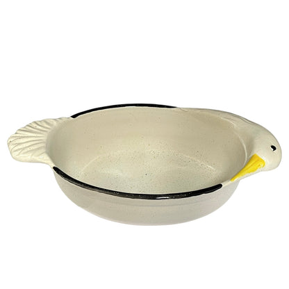White ceramic bowl with black rim and a goose head decoration on a white background