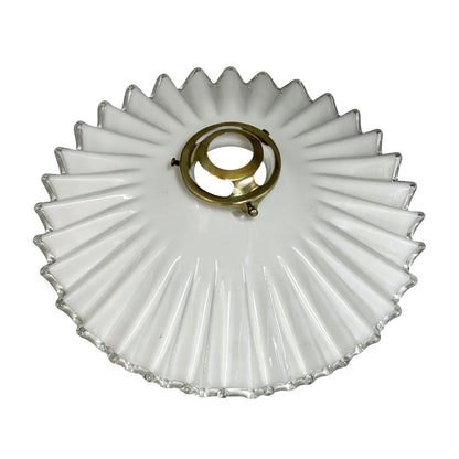 White scalloped-edge glass lampshade with brass fitting on a white background, for a period living room styling or vintage home decor 