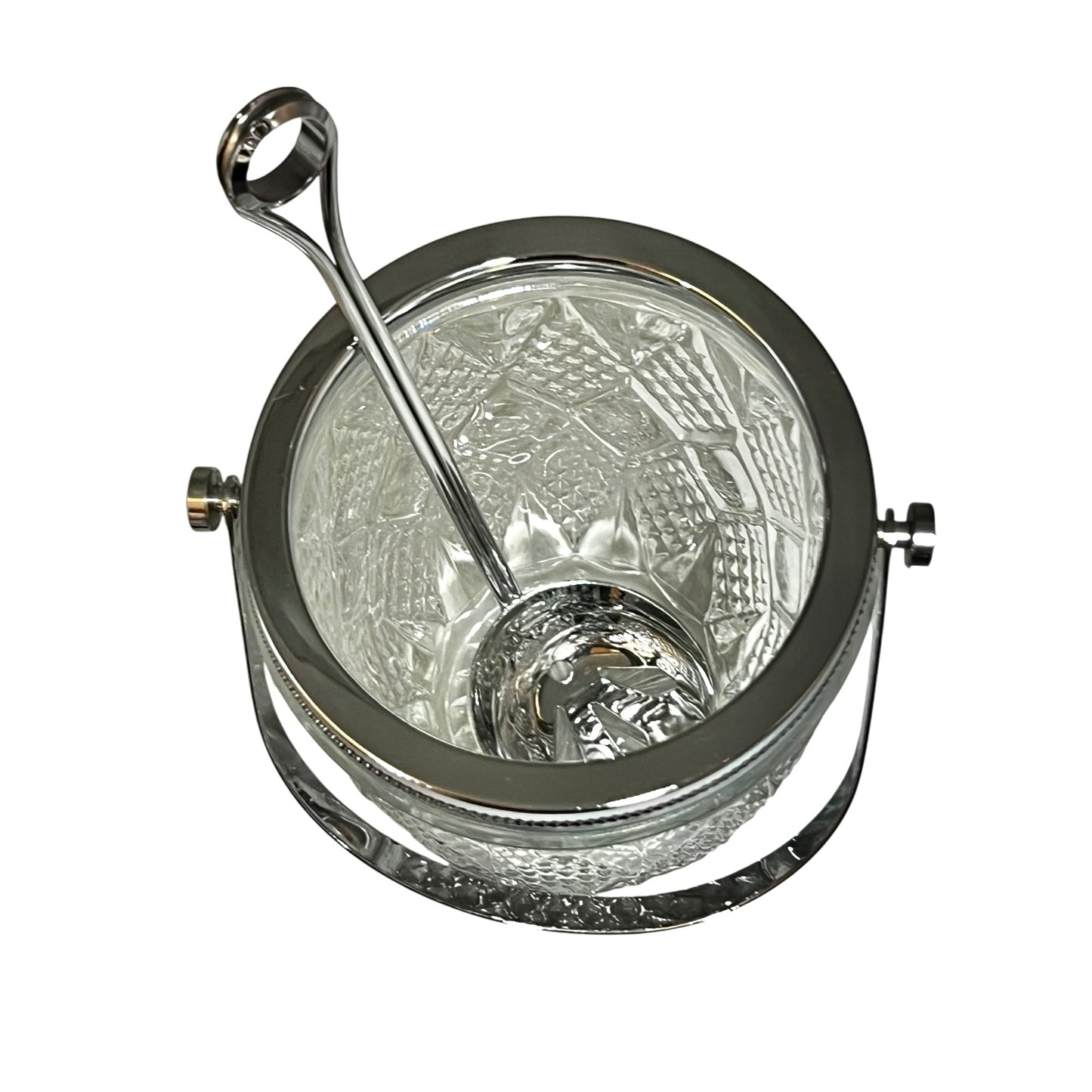 Clear glass ice bucket with silver scoop and handle on a white background