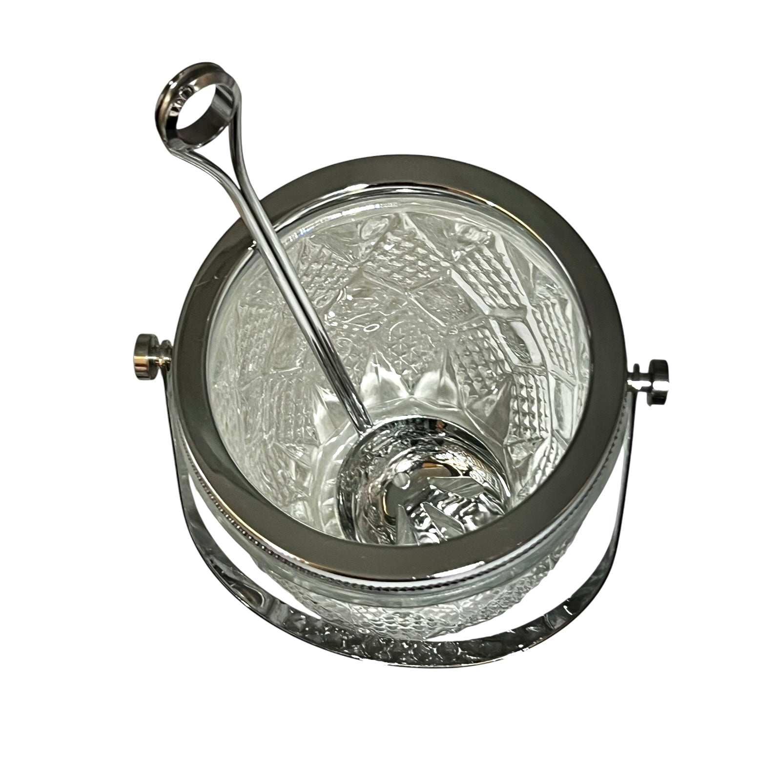 Clear glass ice bucket with silver scoop and handle on a white background