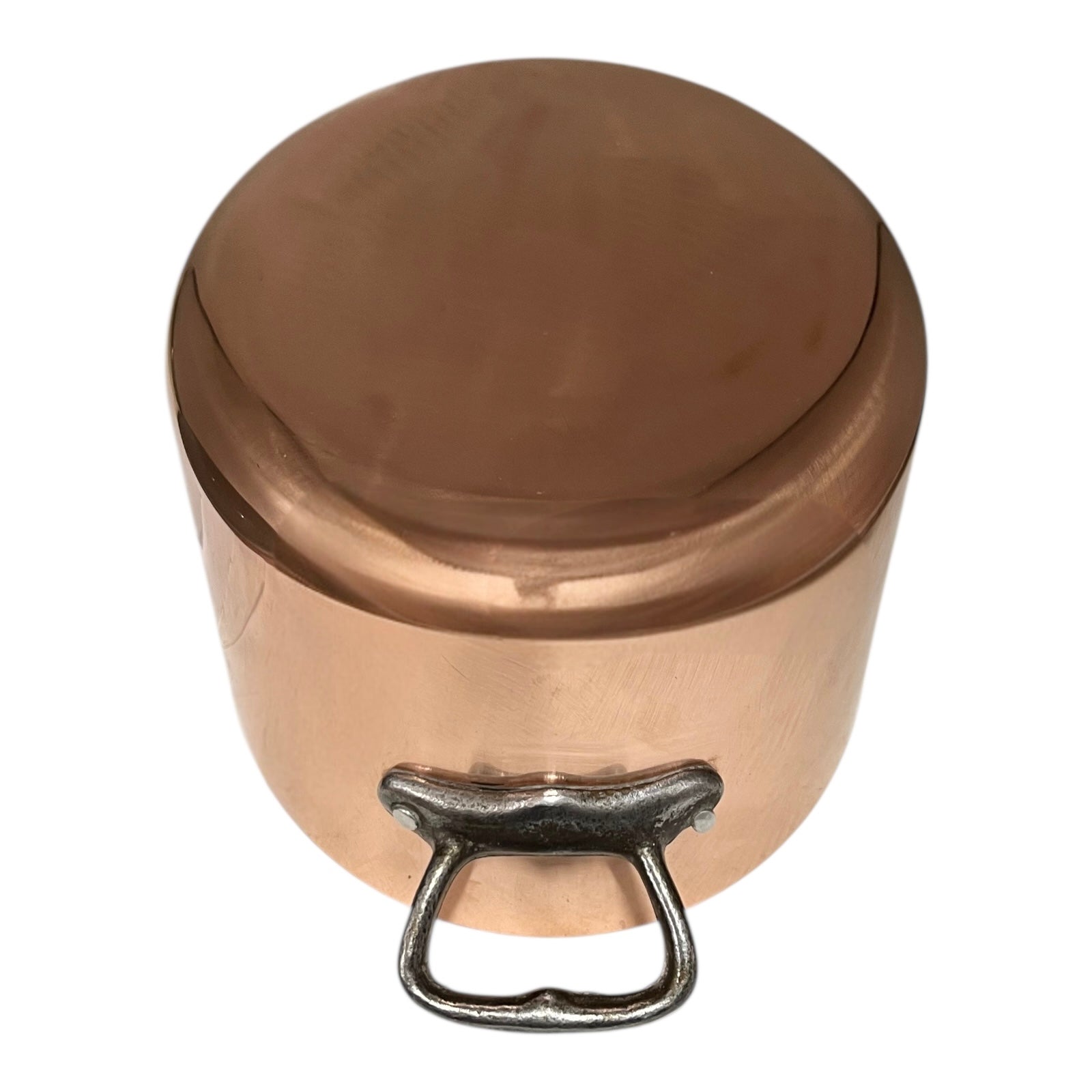 Close-up of the inner of a  copper pot handle on a white background