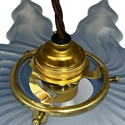 Close-up of a blue textured glass lampshade