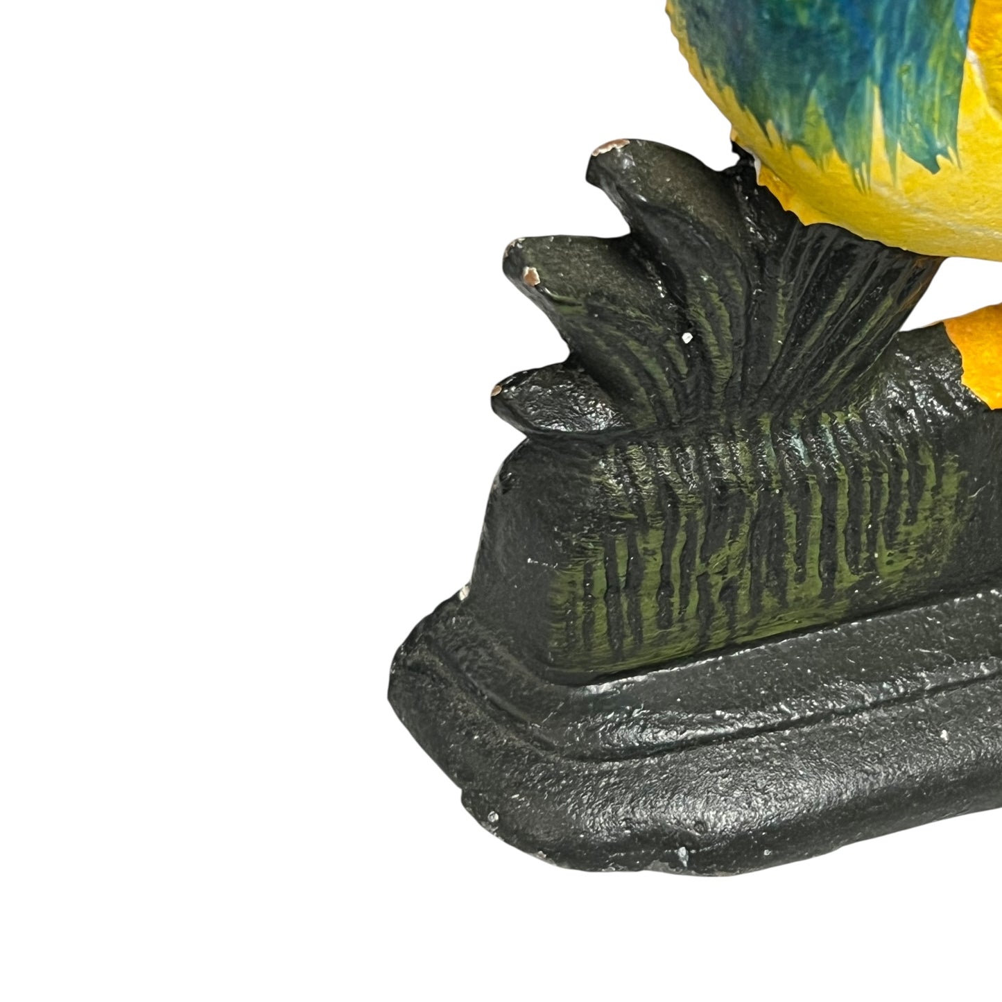 Close up of cast iron doorstop on a white background