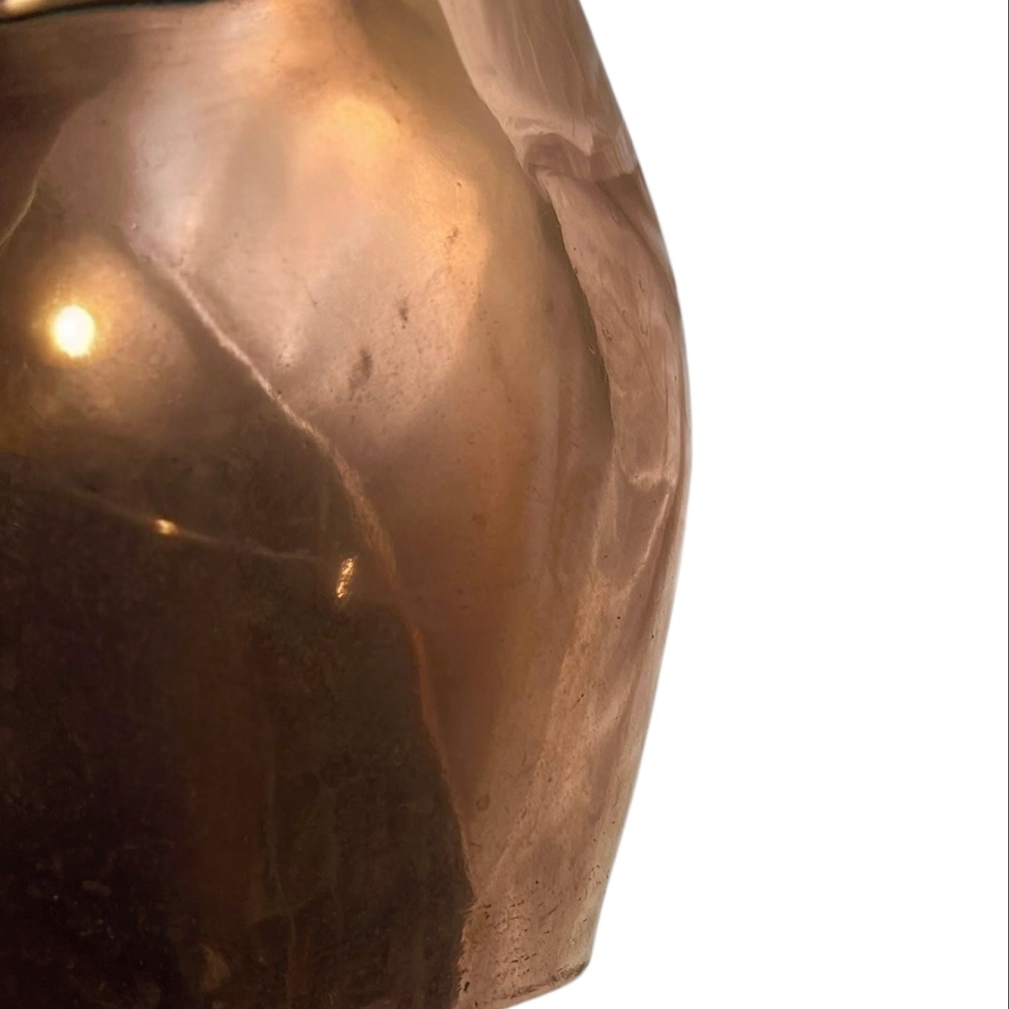 Close up of a copper cooking pot stockpot with handles on a white background
