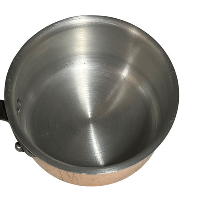 inside view of a lined saucepan on a white background