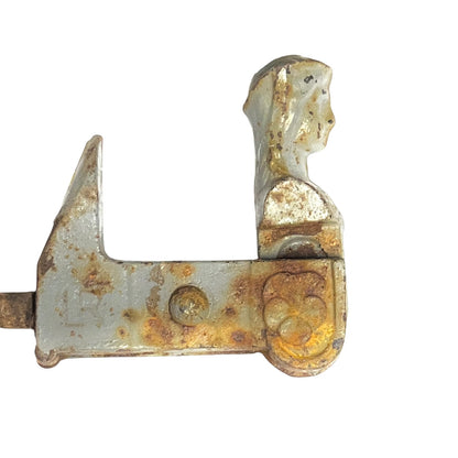 A vintage metal shutter catch with a weathered, rusted finish, isolated on a white background.
