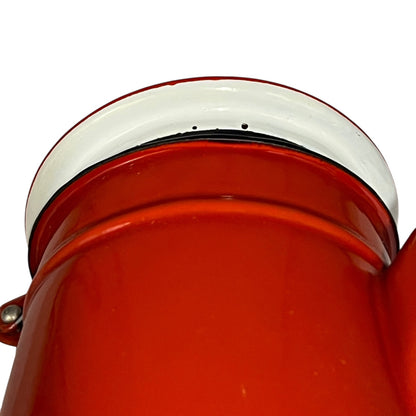 Close-up of a red teapot on a white background