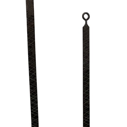 Close up of French copper kitchen utensils with black handles on a white background