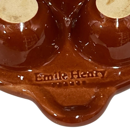 Brown ceramic mold with 'Emile Henry' branding on a white background