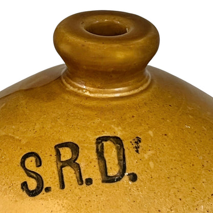Vintage British militaria SRD jar on a white background 