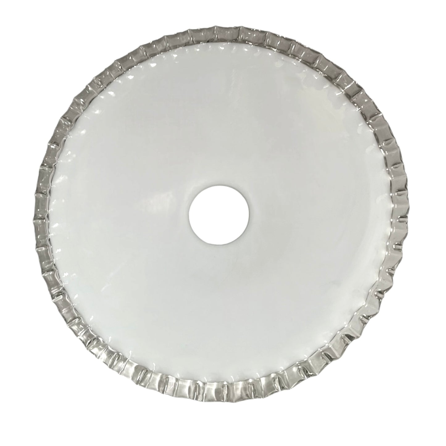 Close-up of a glass lampshade with a decorative edge on a white background