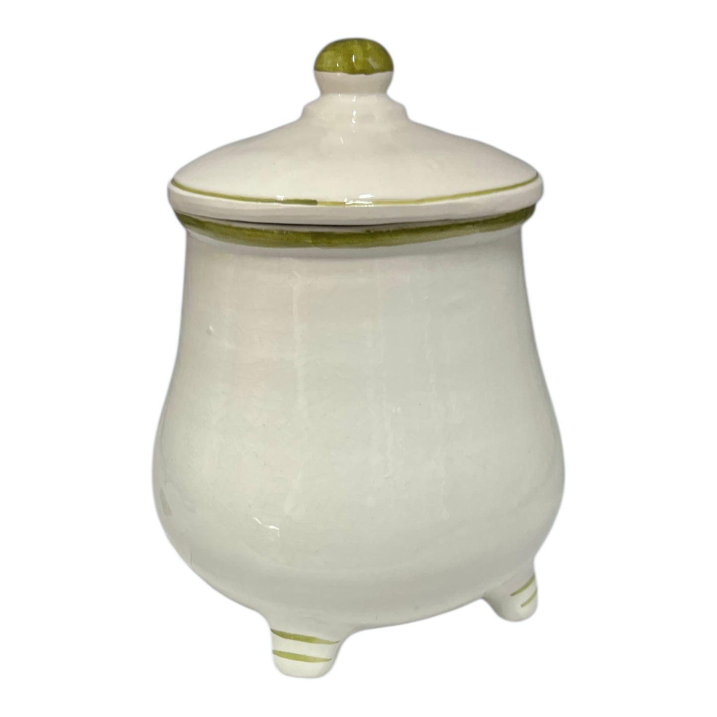 White ceramic jar with green accents on a white background