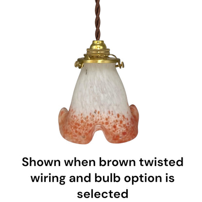 Bell shaped mottled coral coloured glass lampshade with a brass collar and wire with text underneath detailing buying options shown on a white background 
