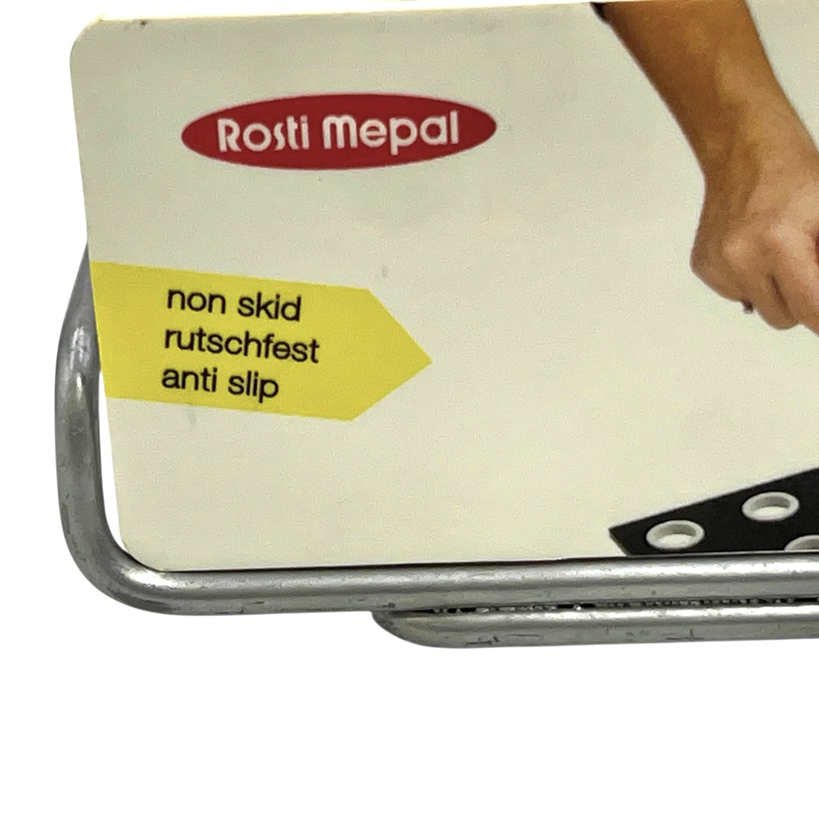 Rosti Mepal non-slip surface with a hand holding it