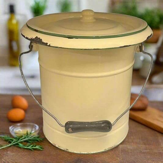 French vintage cream and green enamel bucket with a lid and handle on a white background