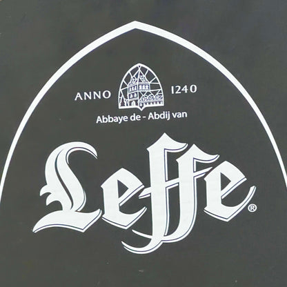 Leffe beer logo with abbey emblem on a black background