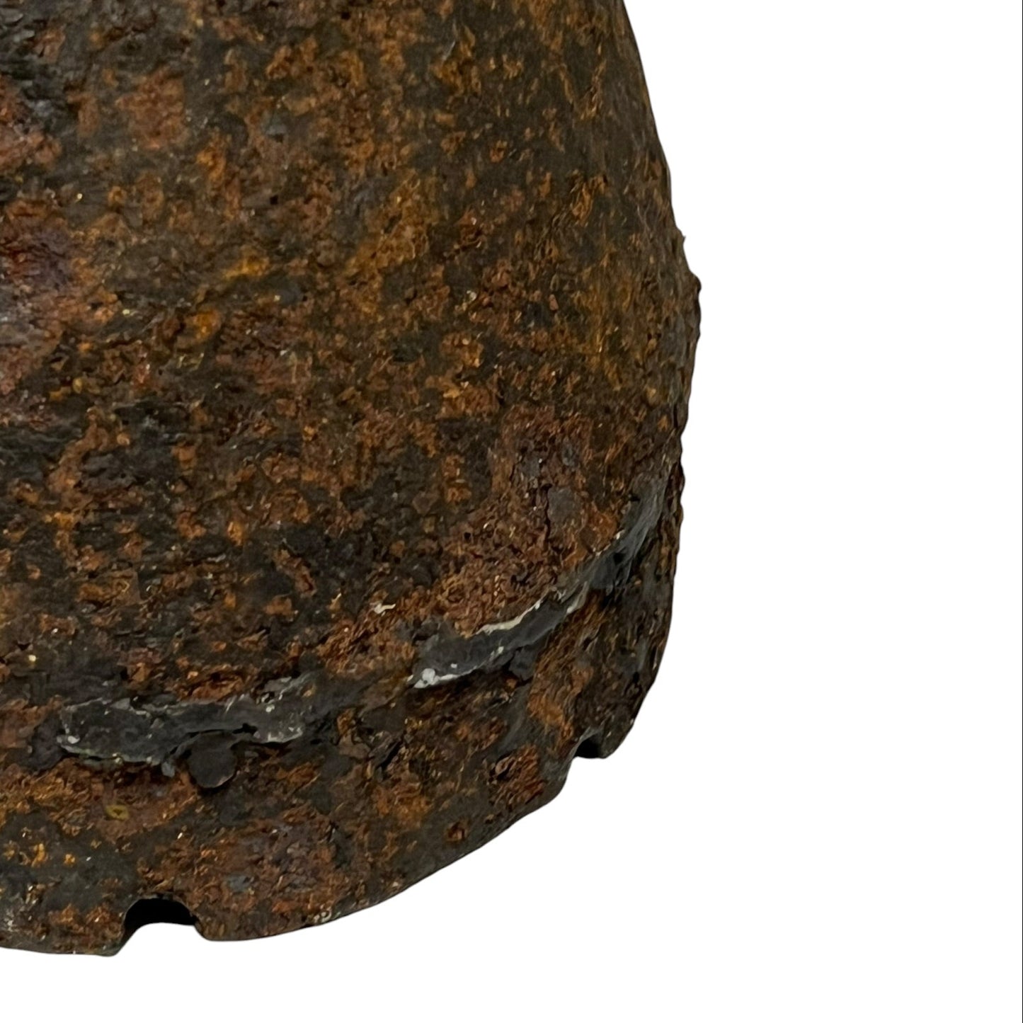 Close up of WW1 brass fuse on a white background