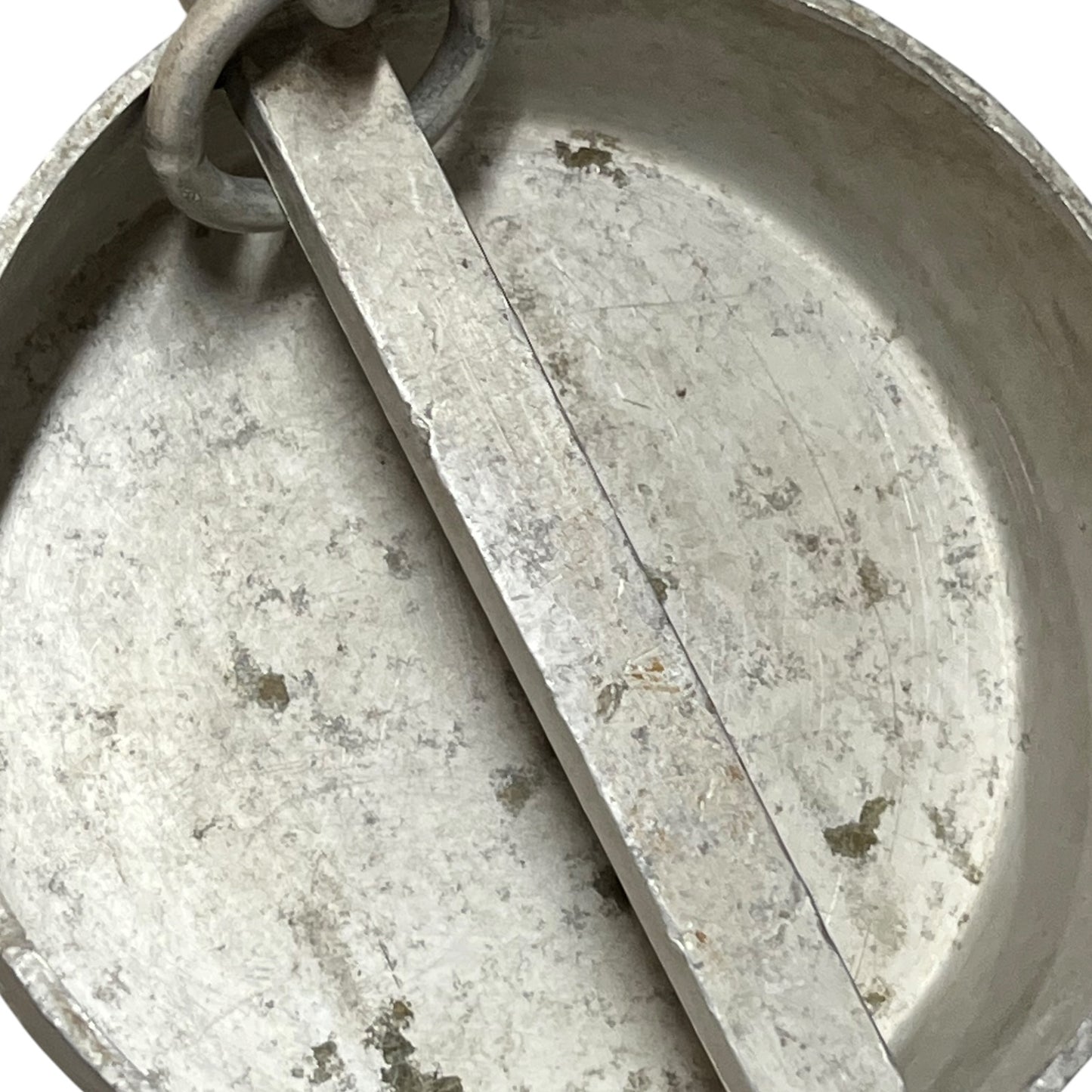Close up of a vintage metal milk churn on a white background