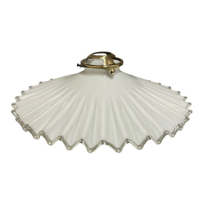White scalloped-edge glass lampshade with brass fitting on a white background, for a period living room styling or vintage home decor 