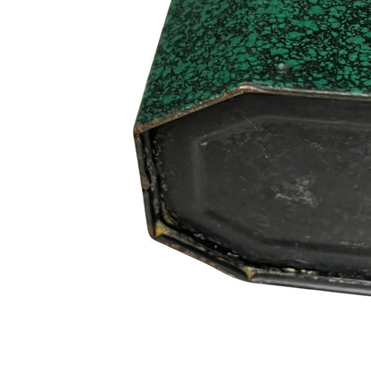 Close up of a French enamel lunch box on a white background