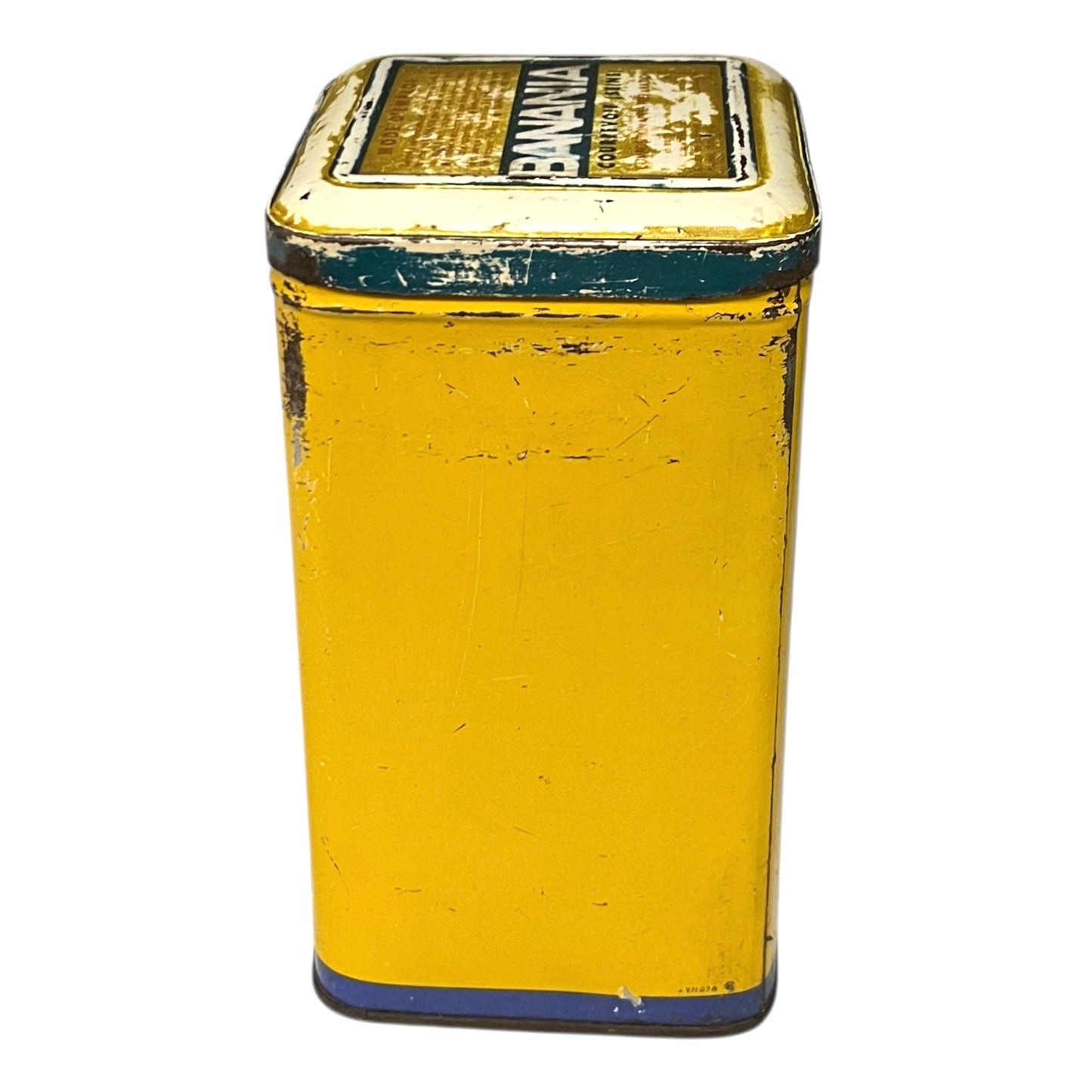 Vintage tin can with a colorful design featuring a face and 'Banania' branding on a white background.