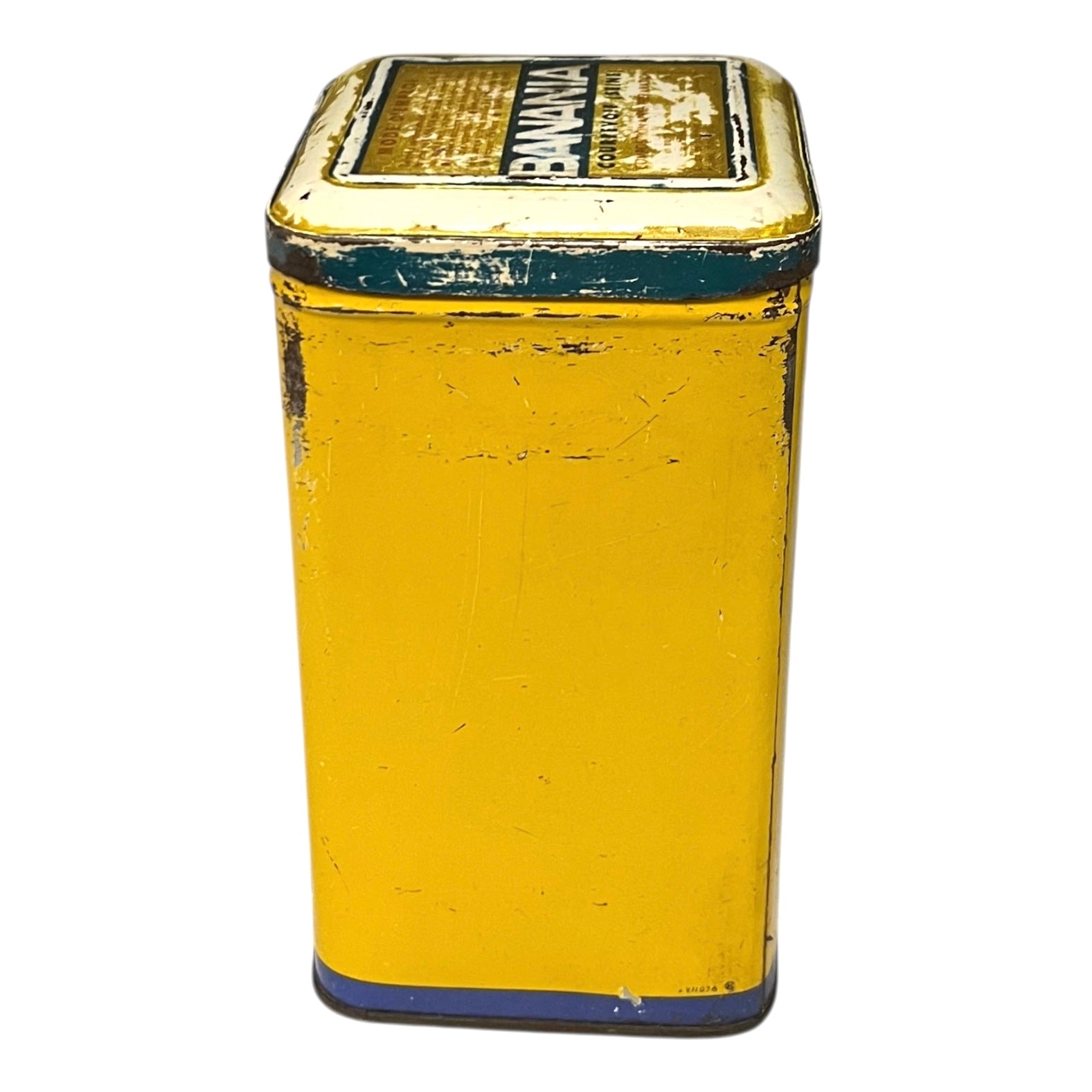 Vintage tin can with a colorful design featuring a face and 'Banania' branding on a white background.