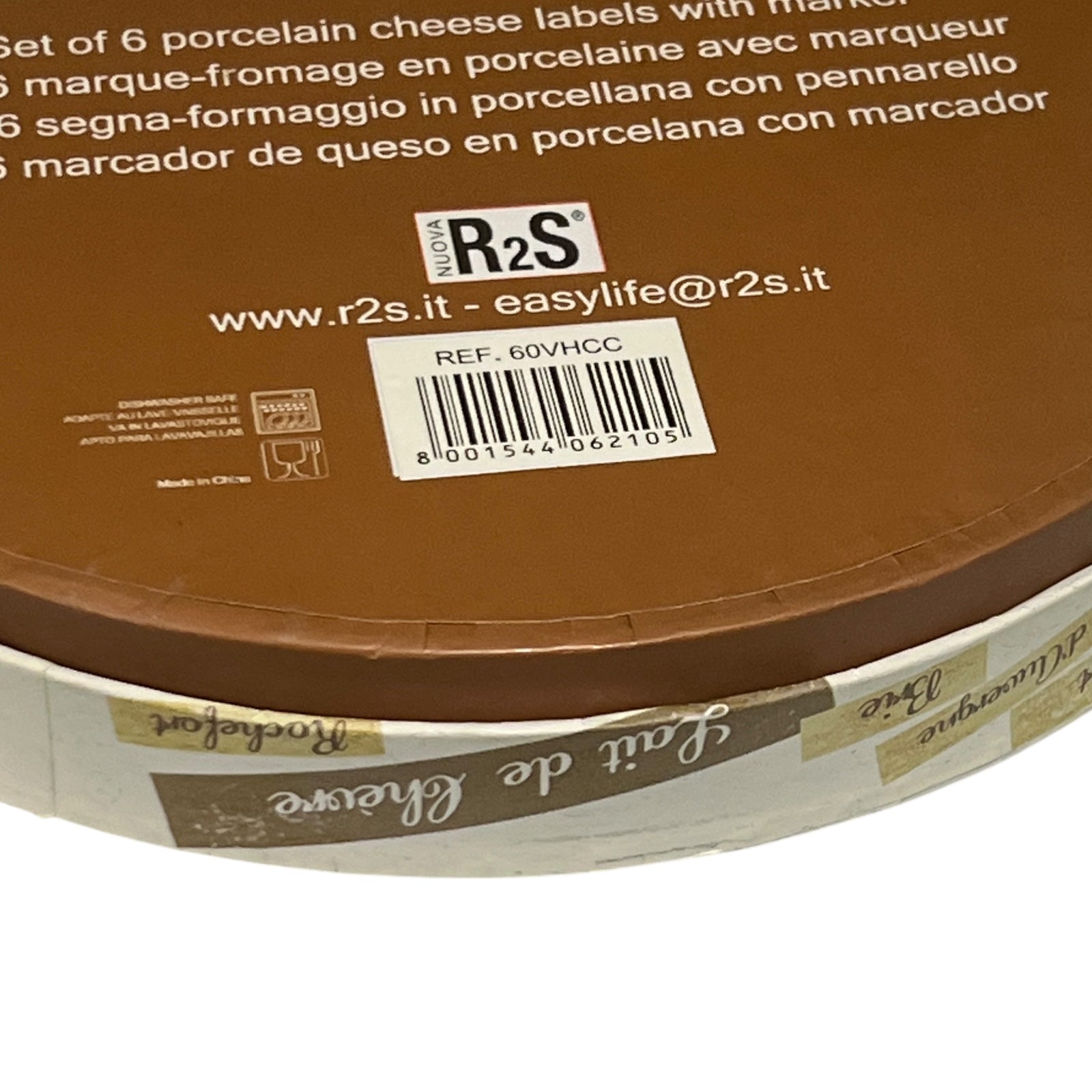 Close-up of a round packaging with R2S branding and product details.