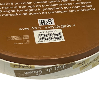 Close-up of a round packaging with R2S branding and product details.