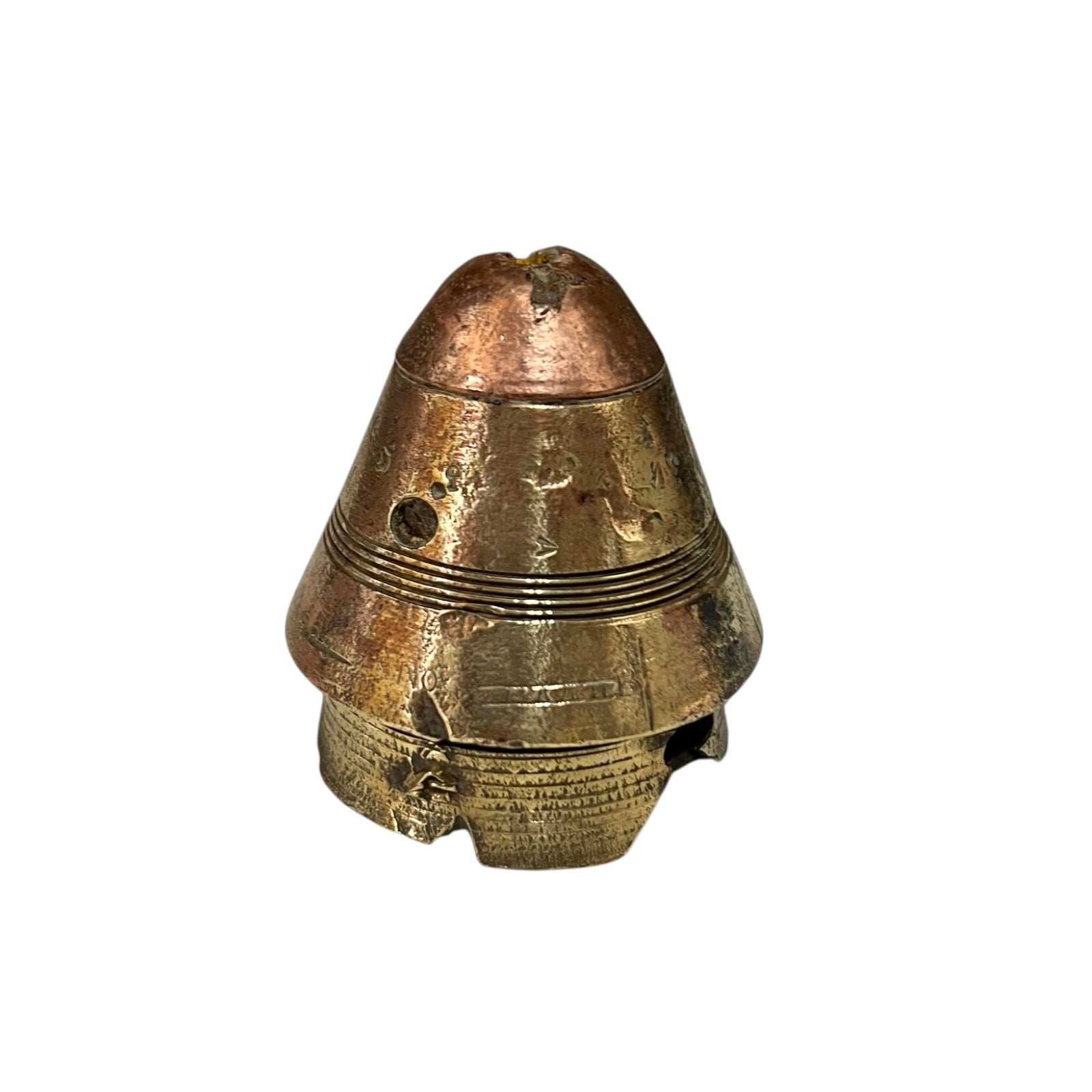 WW1 relic brass fuse number 102, ideal as a paperweight n a white background