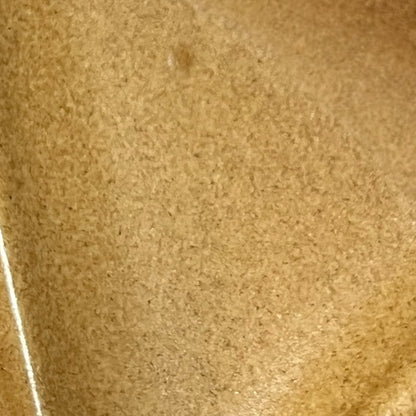Close-up of a textured beige surface