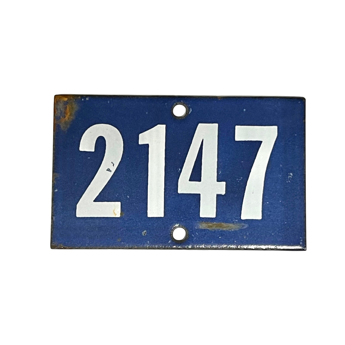 Blue and white enamel door number 2147 on a white background 