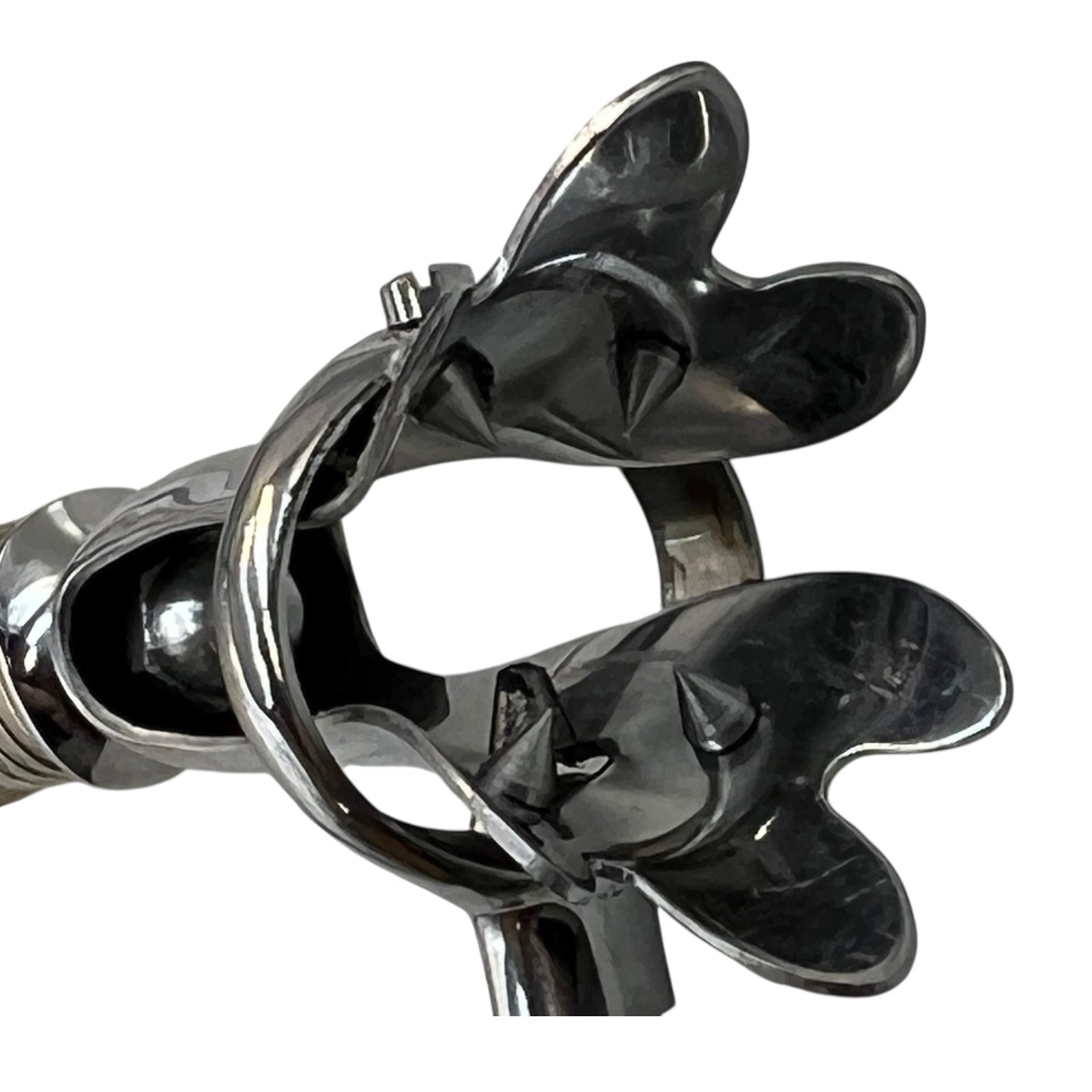 Traditional French vintage gigot with a deer hoof handle on a white background, ideal for a taxidermy collector 