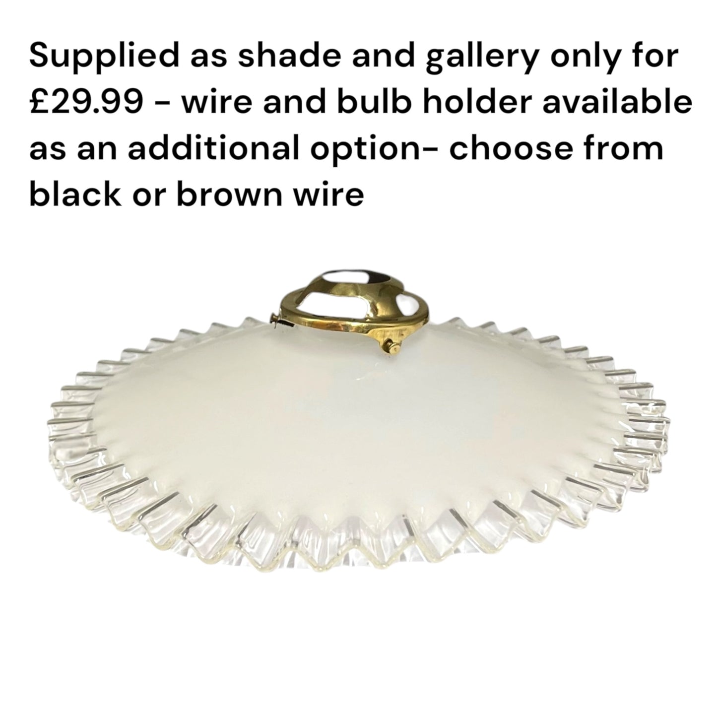 An off-white glass shade with a scalloped edge and a brass wire hanger, shown on a white background with descriptive text at the top.