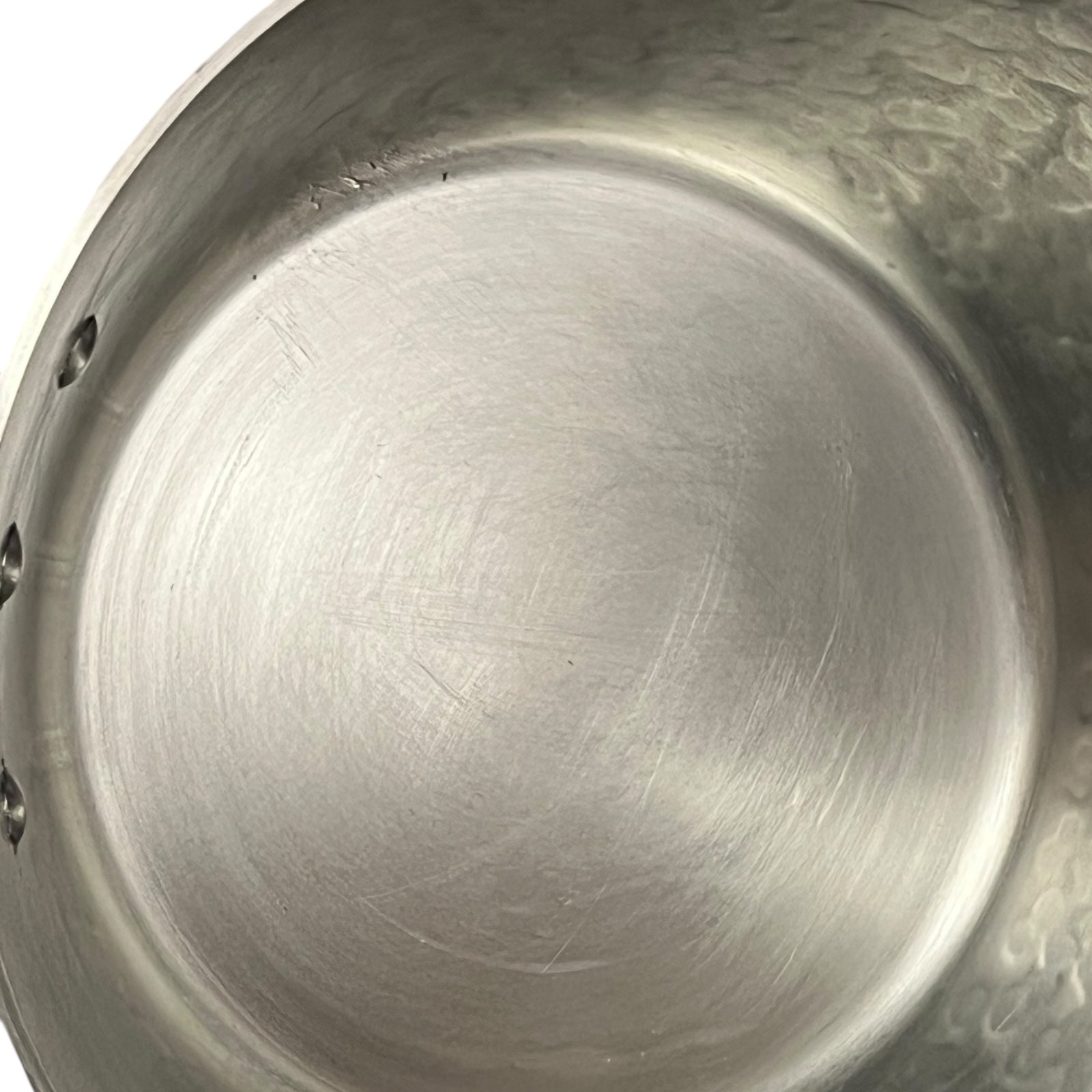 inside  lining of copper saucepan 