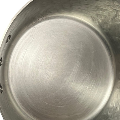 inside  lining of copper saucepan 