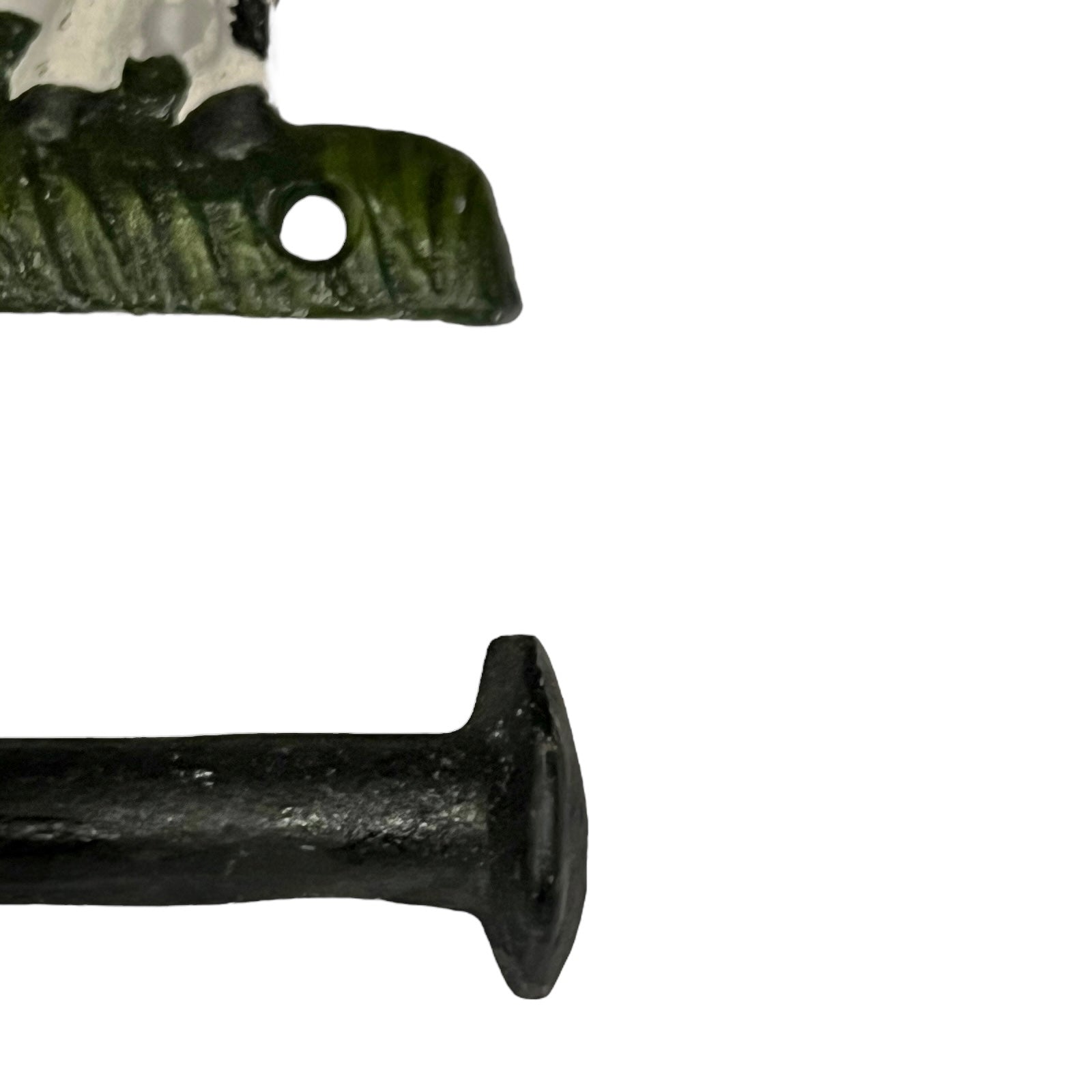 Close-up of a cow-shaped toiler paper roll holder  on a white background