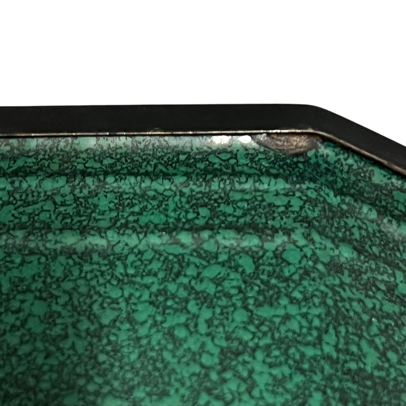 Close up of a French enamel lunch box on a white background