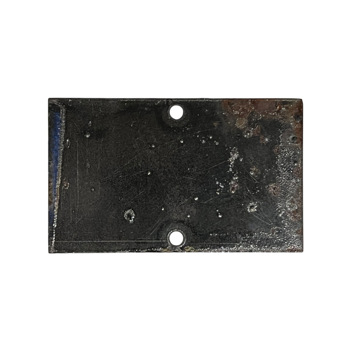 A rectangular black metal plate with two pre-drilled holes, showing signs of rust, wear, and scratches, isolated on a white background.