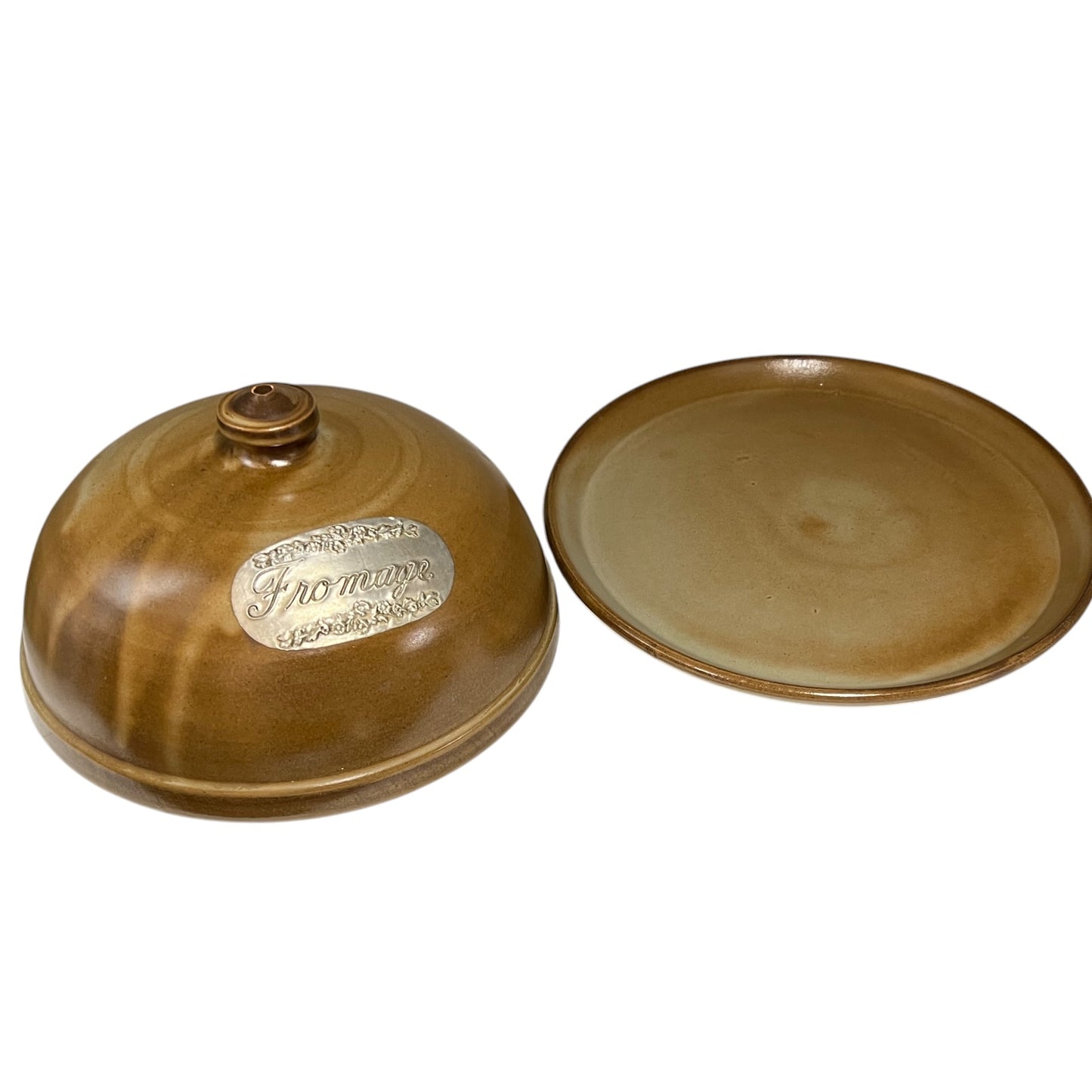 brown ceramic pot with a visible fromage label on a white background