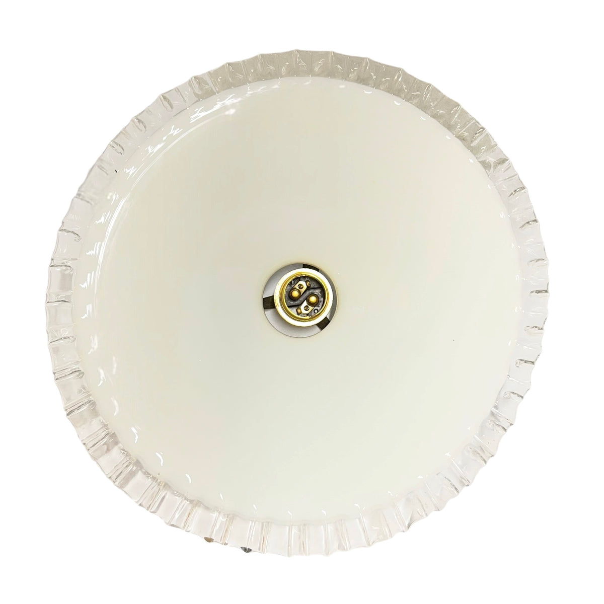 A round, off-white ceiling light fixture with a fluted or scalloped outer rim and a central metal socket, shown against a plain white background.