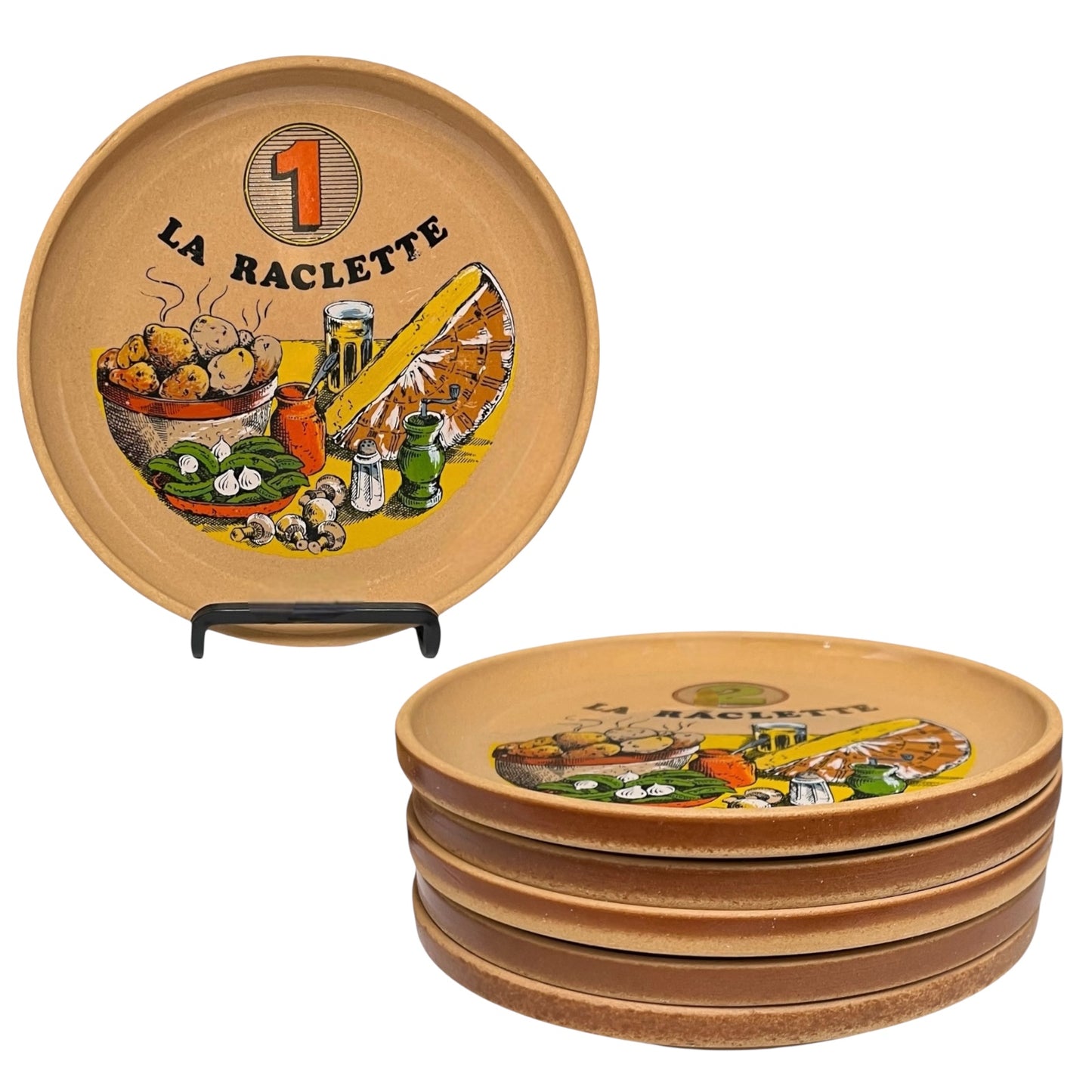 Set of plates with 'La Raclette' branding and illustrations on a white background
