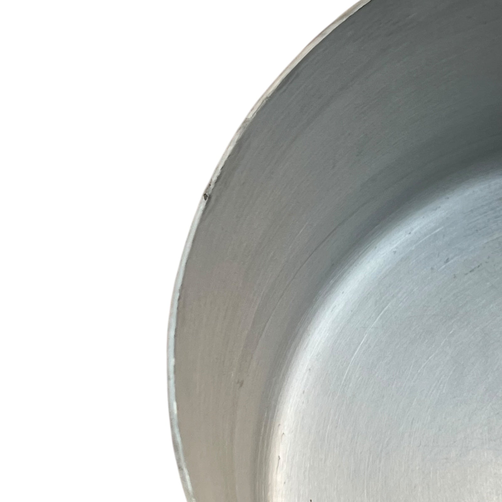 rim of aluminium lined copper pan