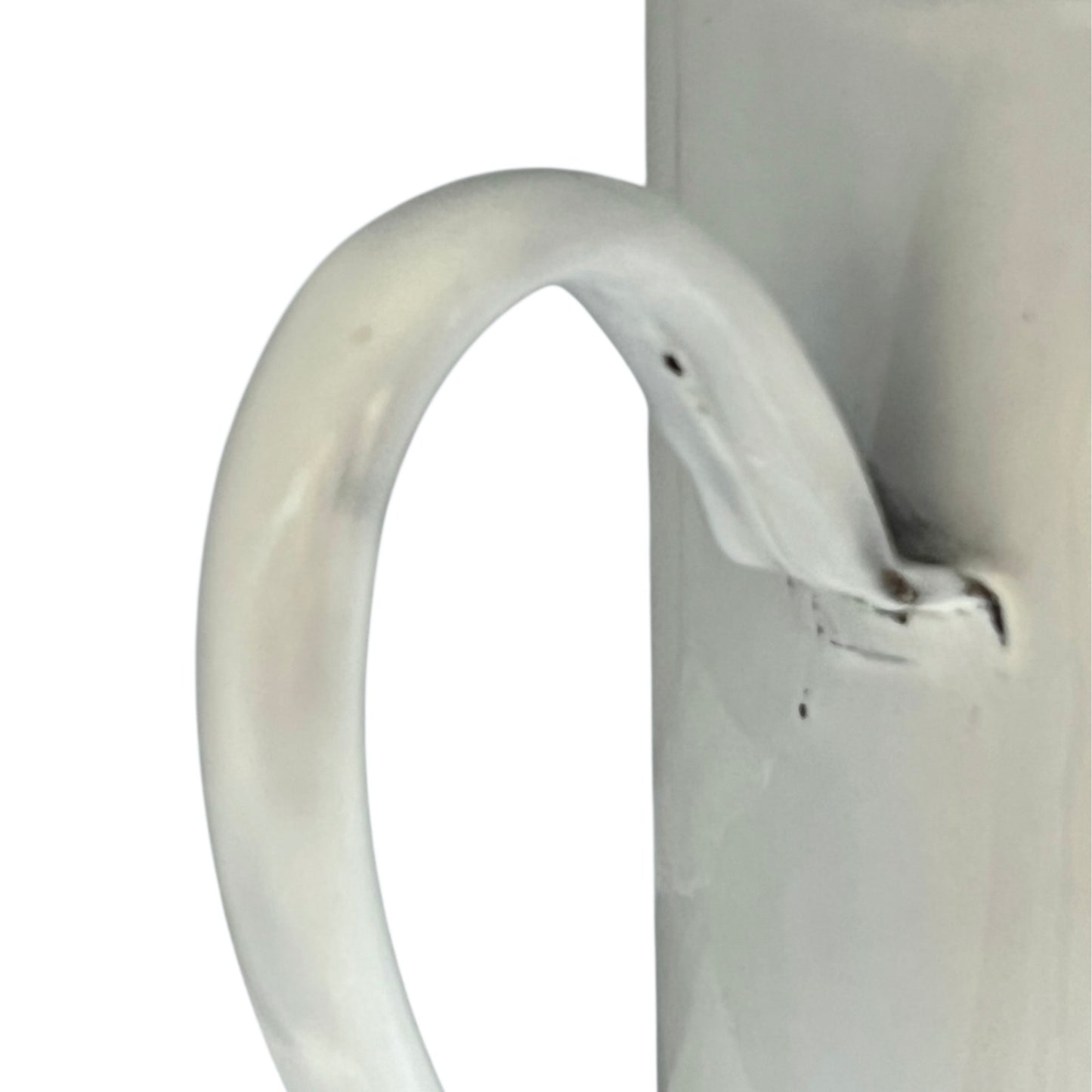 Close up of  French vintage enamel planter with a flat back and a spout on a white background